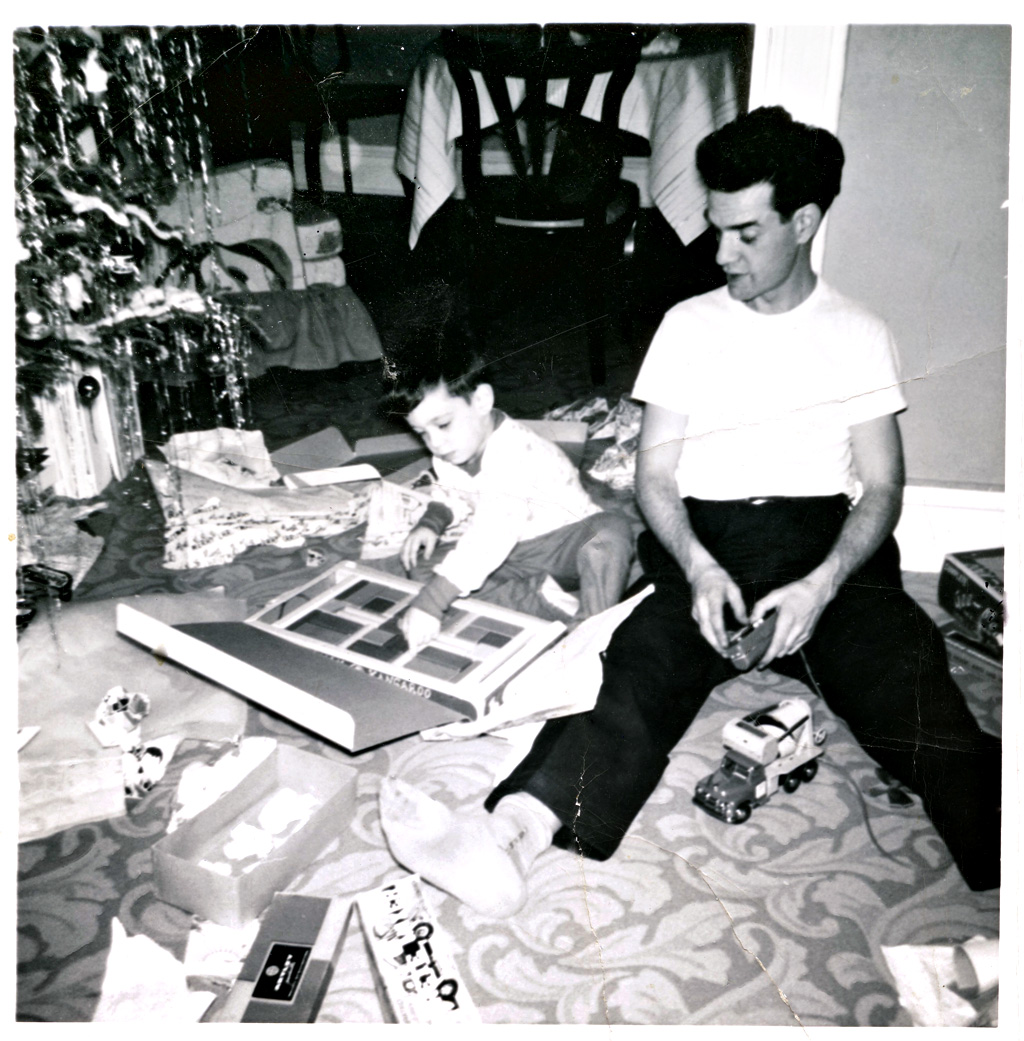 Ronnie and Uncle Chuck opening presents
