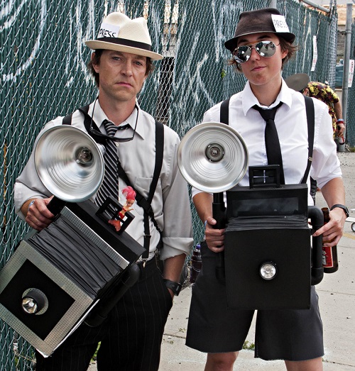 Marchers with homemade large cameras, 2011