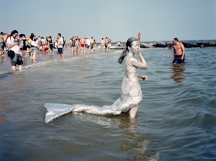 Silver mermaid in the water, 2002