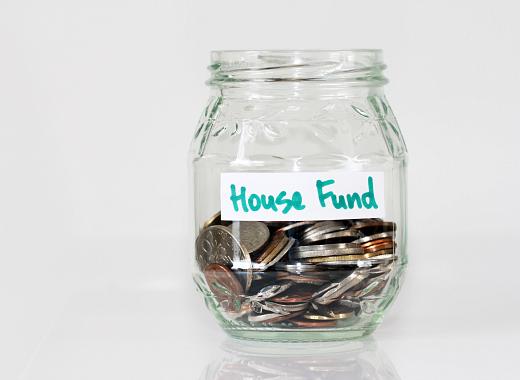 House Fund jar with coins
